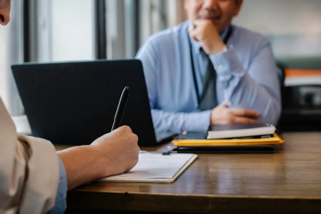 Florida personal injury attorney discussing pain and suffering compensation with an injured client